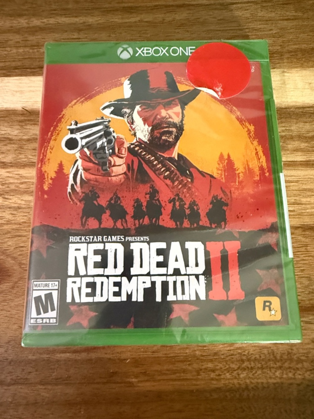 Red Dead Redemption II for Xbox One - Red and Orange Cover by Rockstar Games